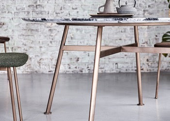 The Yutapi Ice Jade Marble & Metal Dining Table