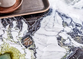 The Yutapi Ice Jade Marble & Metal Dining Table