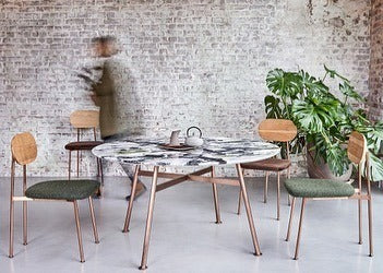 The Yutapi Ice Jade Marble & Metal Dining Table